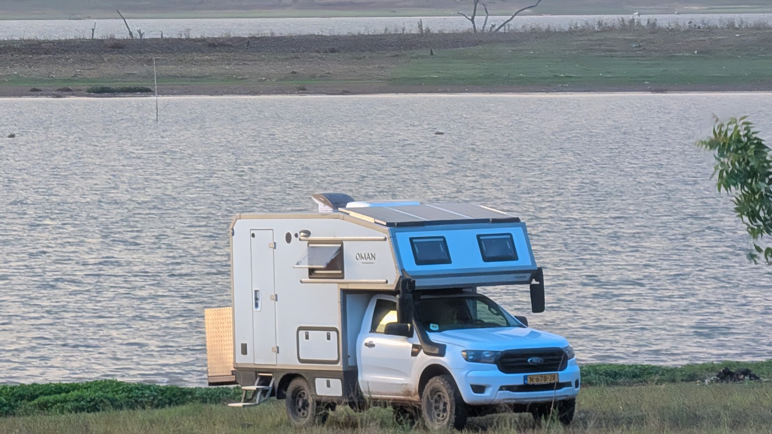 Campervan beside the river